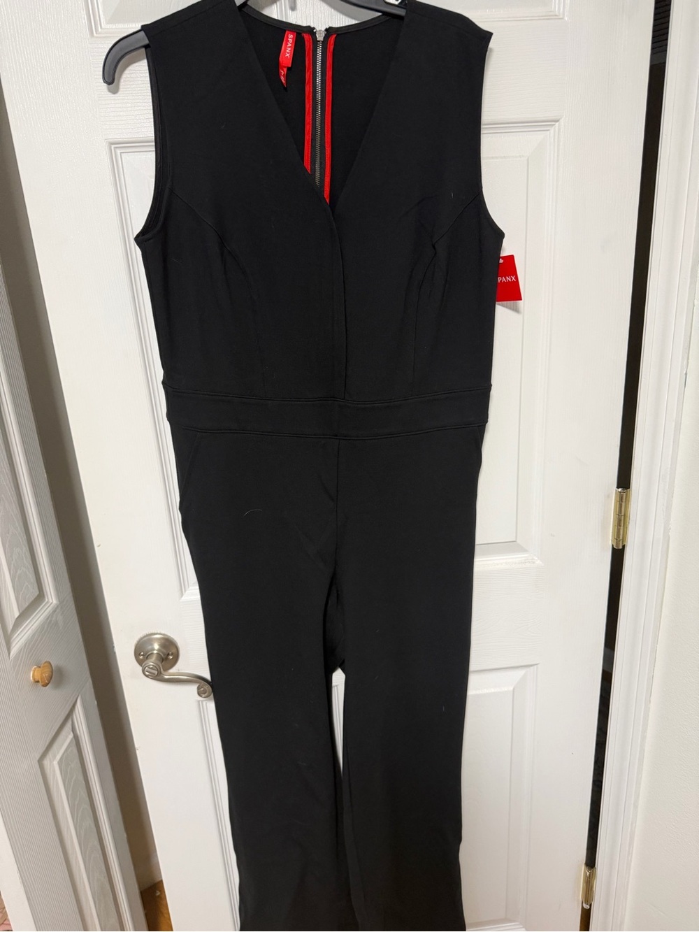 SPANX Black Sleeveless V-Neck Jumpsuit with Red Zip Detail